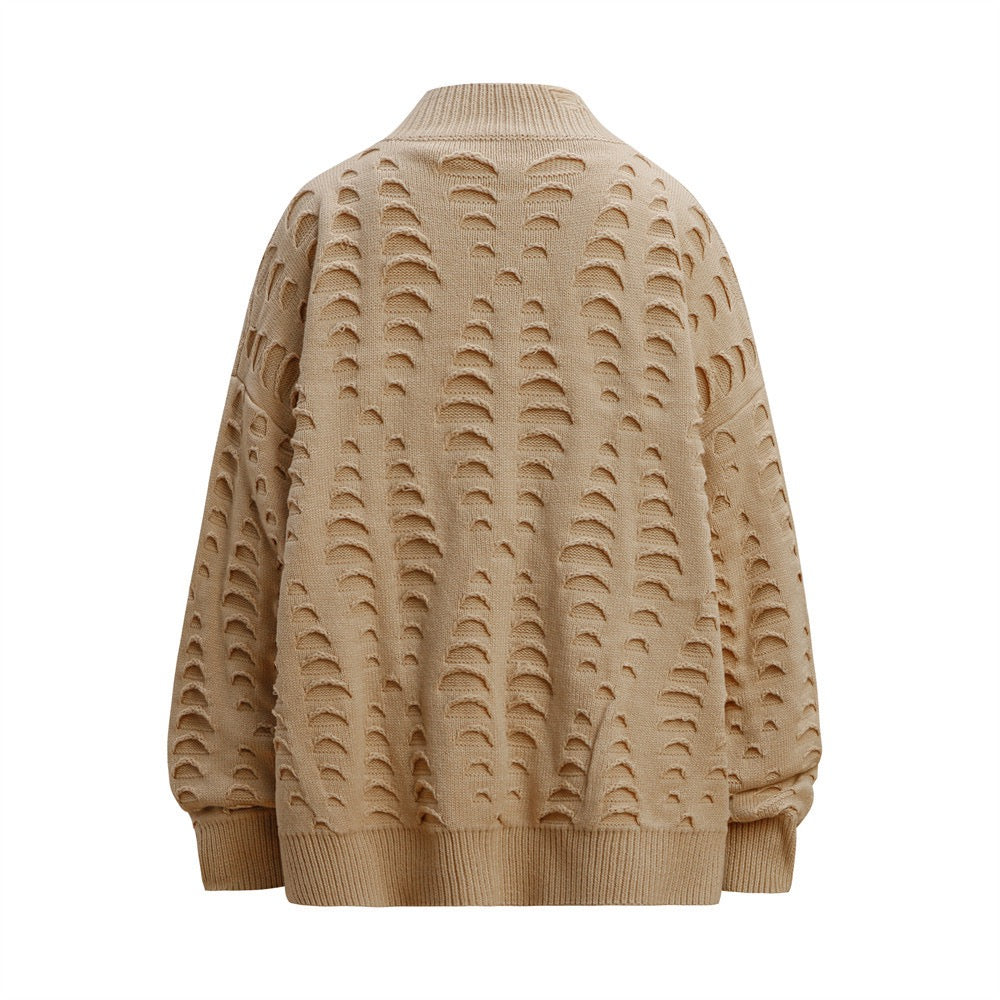Beige sweater with a textured pattern on a white background