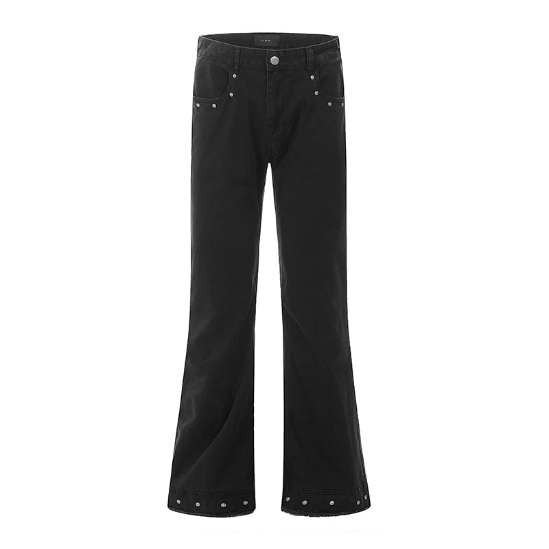 Black pants with silver buttons on a white background