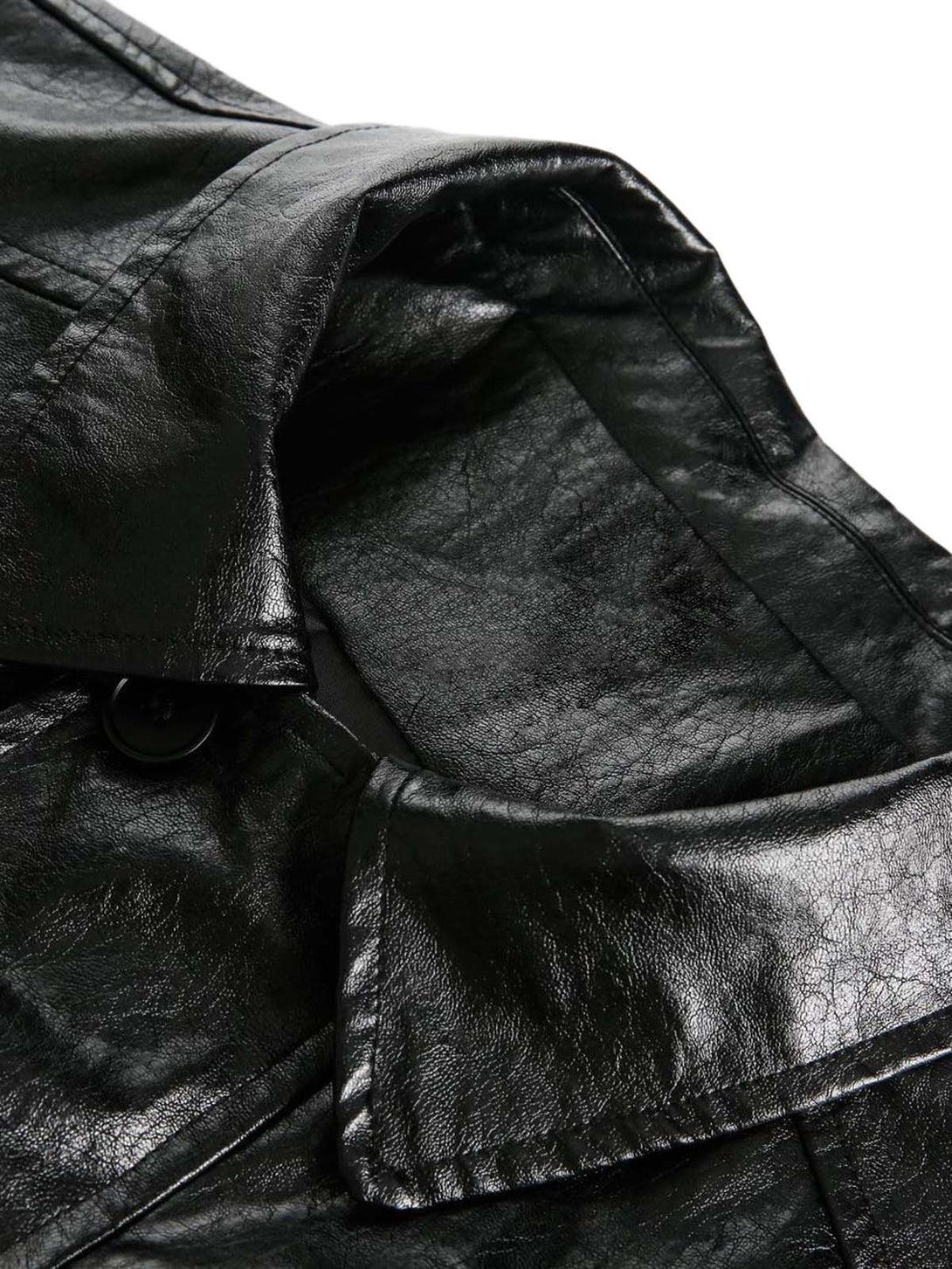 Close-up of a black leather jacket with a focus on texture and stitching.