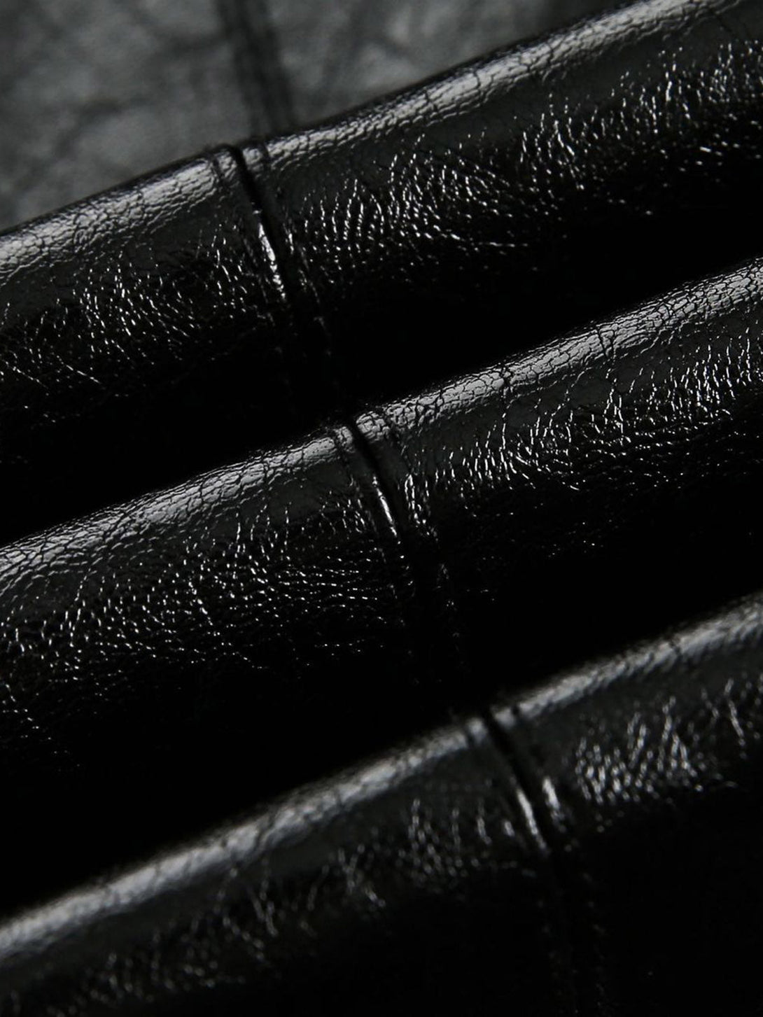 Close-up of black leather texture